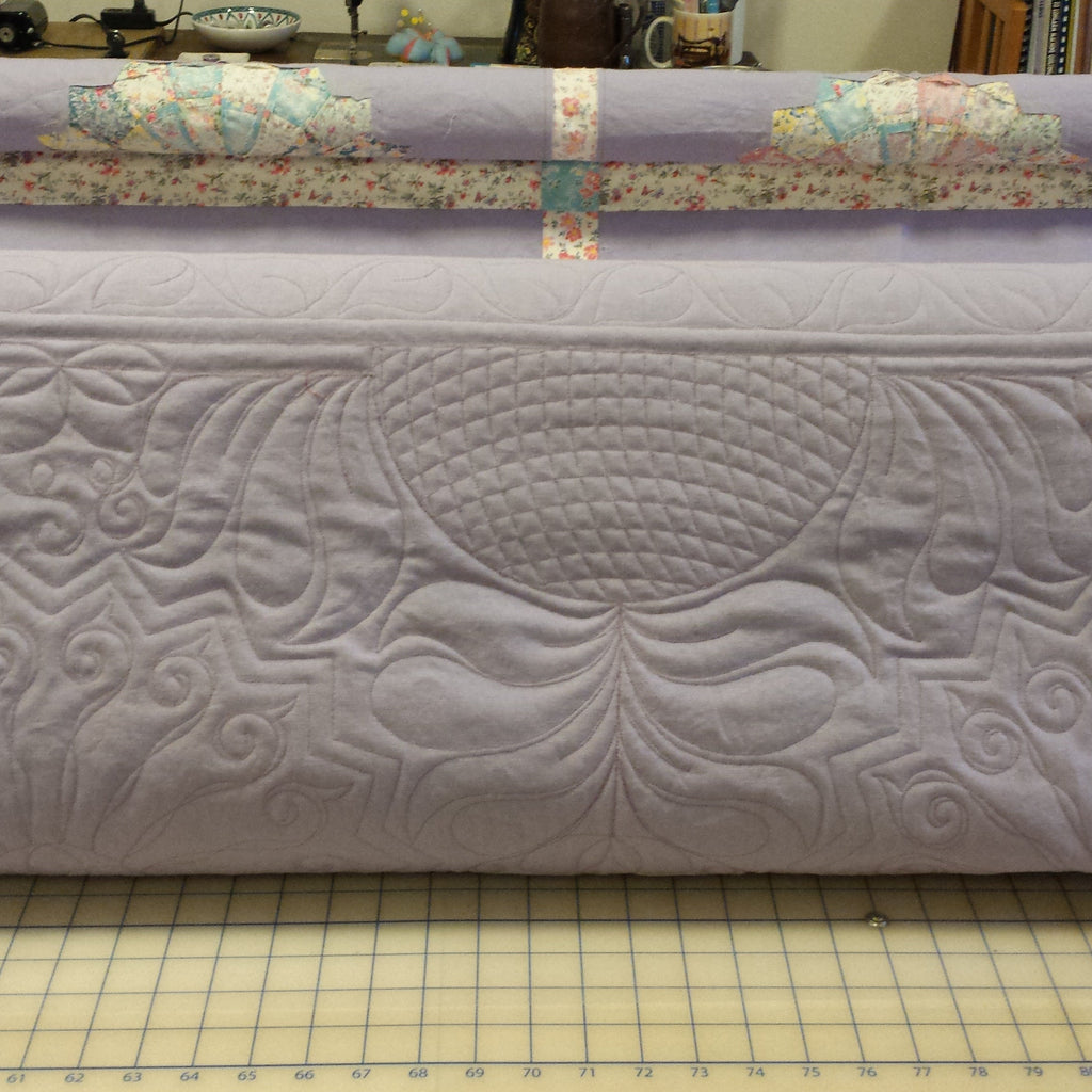 Quilted fabric with a floral border