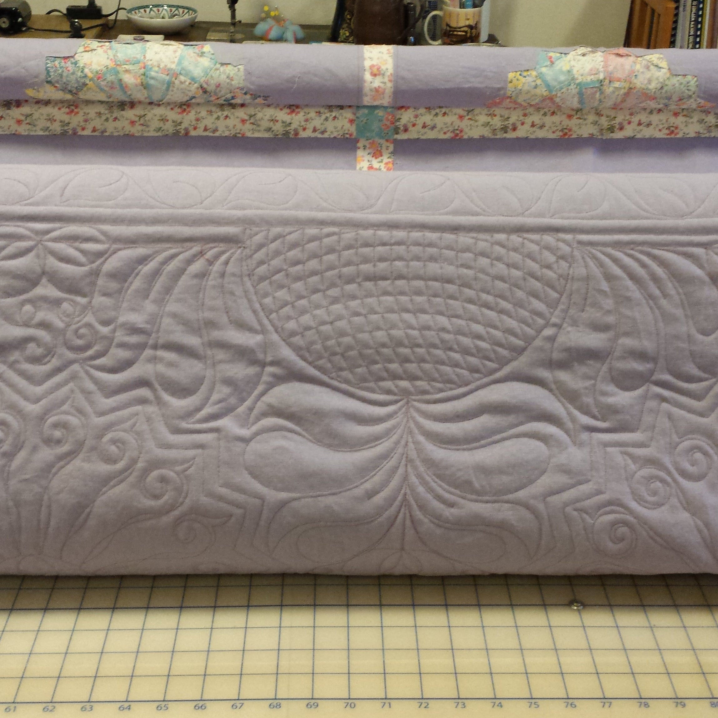 Quilted fabric with a floral border