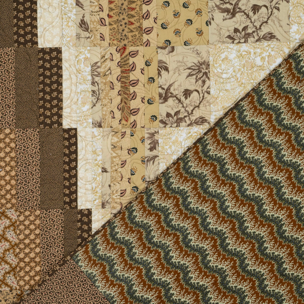 Collection of patterned fabric swatches in earthy tones.