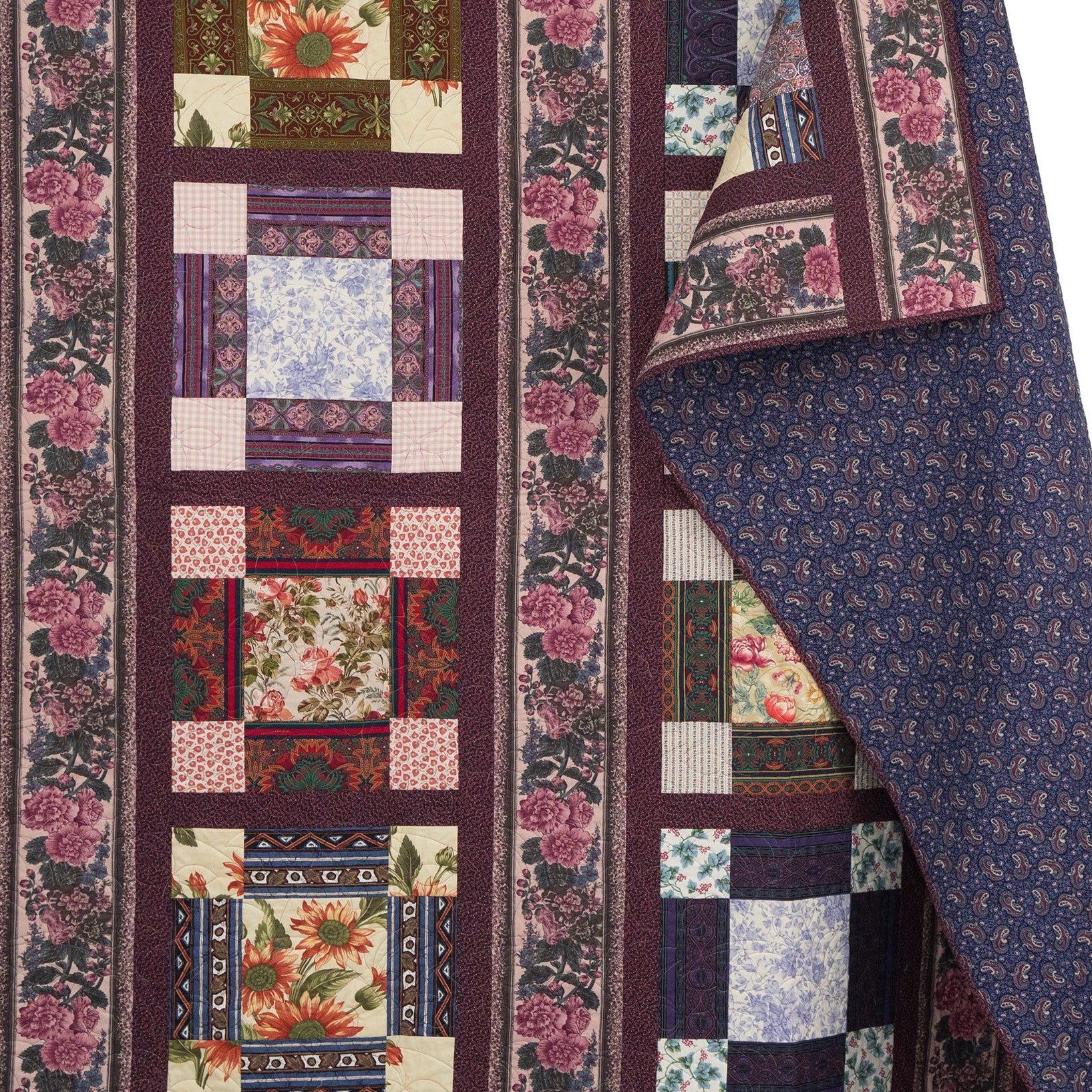 Patchwork quilt with floral and geometric patterns