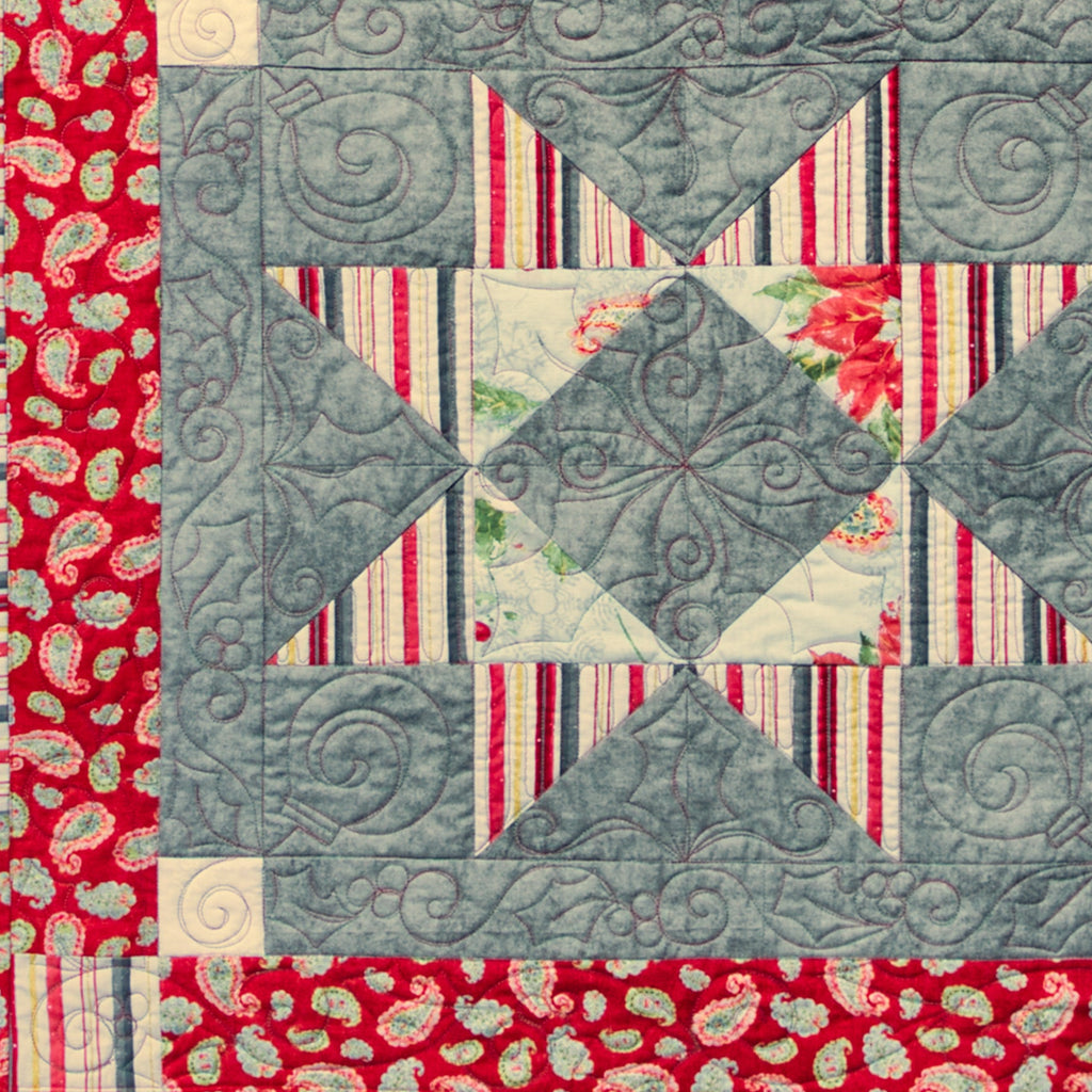 Quilt block with red, white, and blue patterns