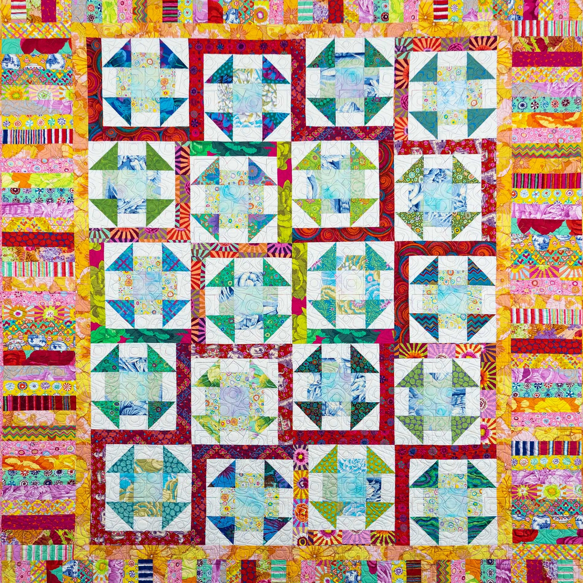 Colorful quilt with geometric patterns and vibrant colors