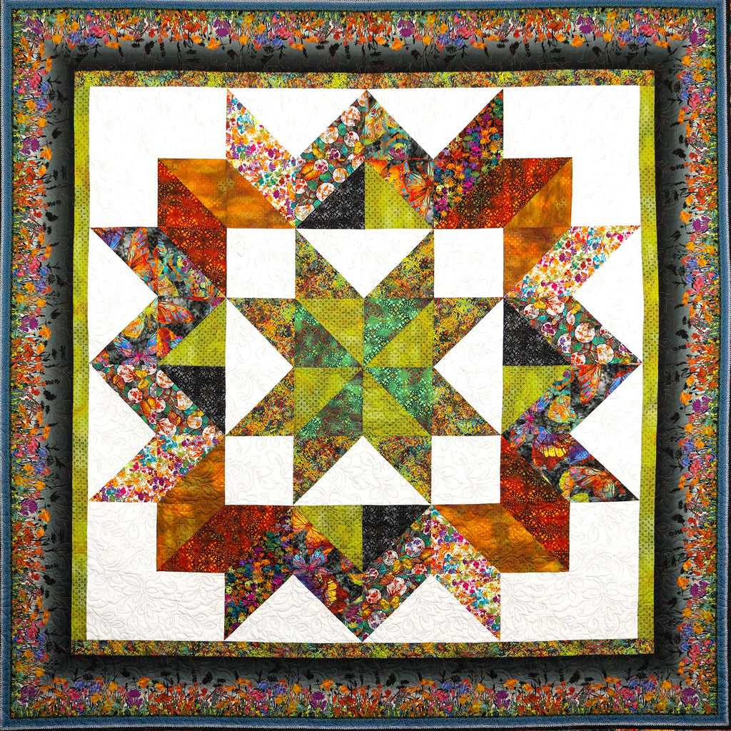 Colorful quilt with star pattern and floral border
