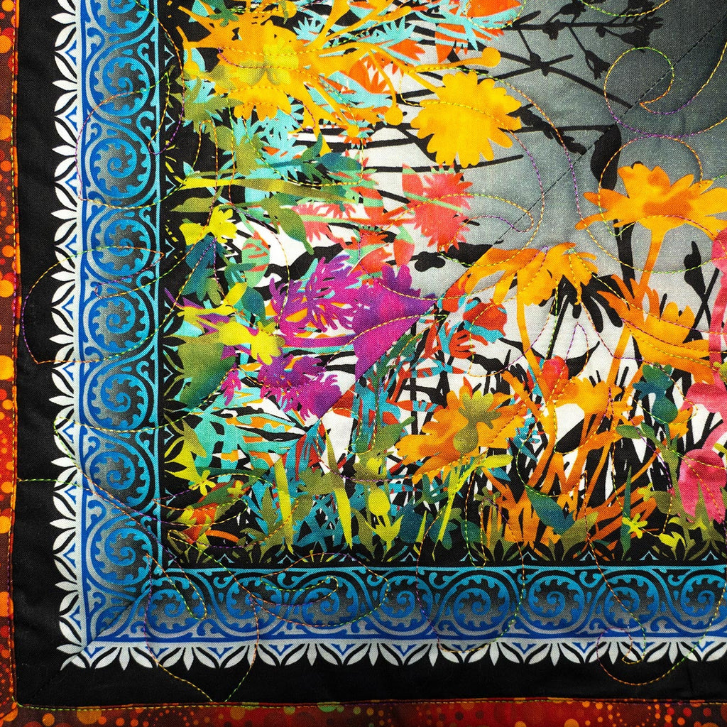 Colorful floral design with intricate border on a textured background
