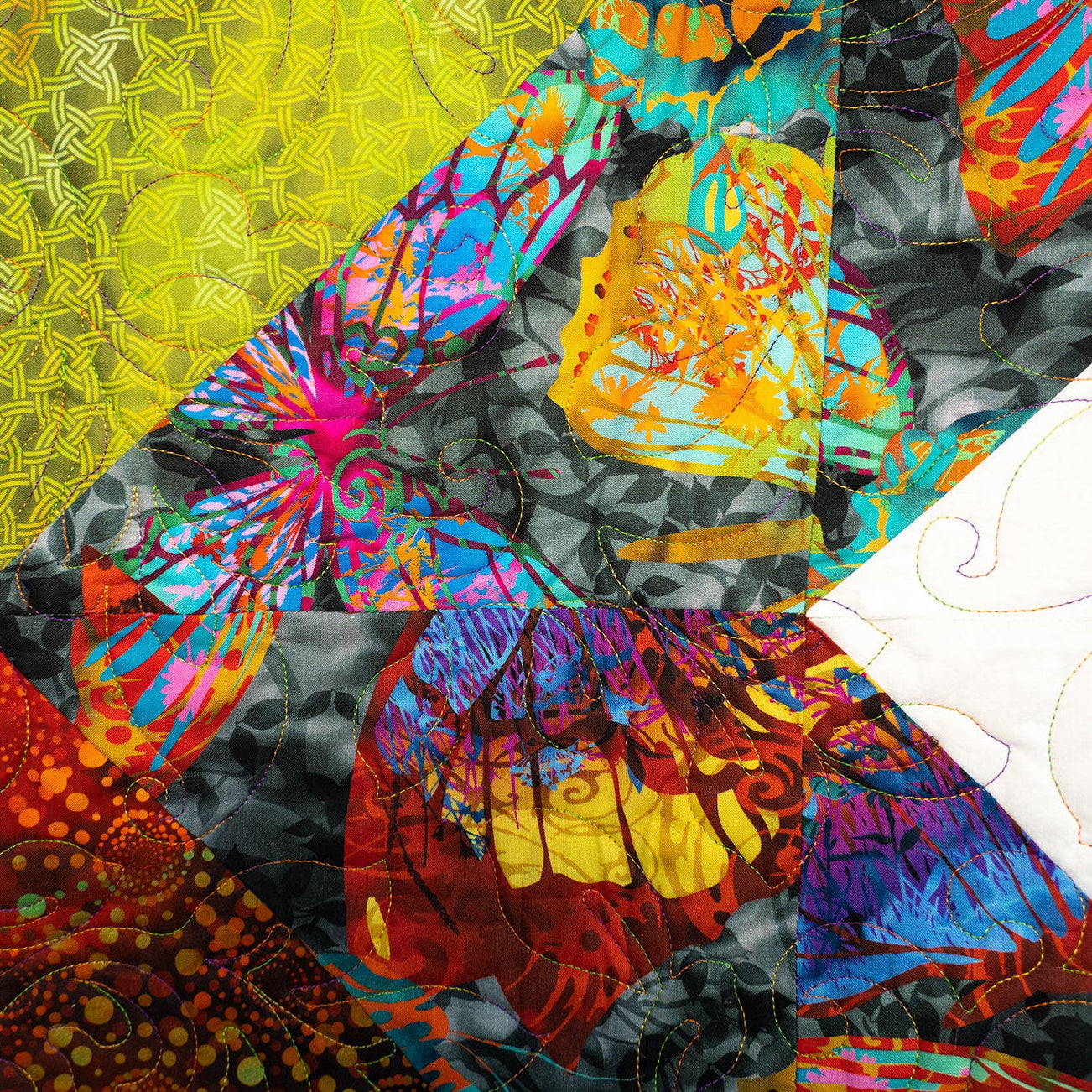 Colorful abstract quilt with geometric patterns