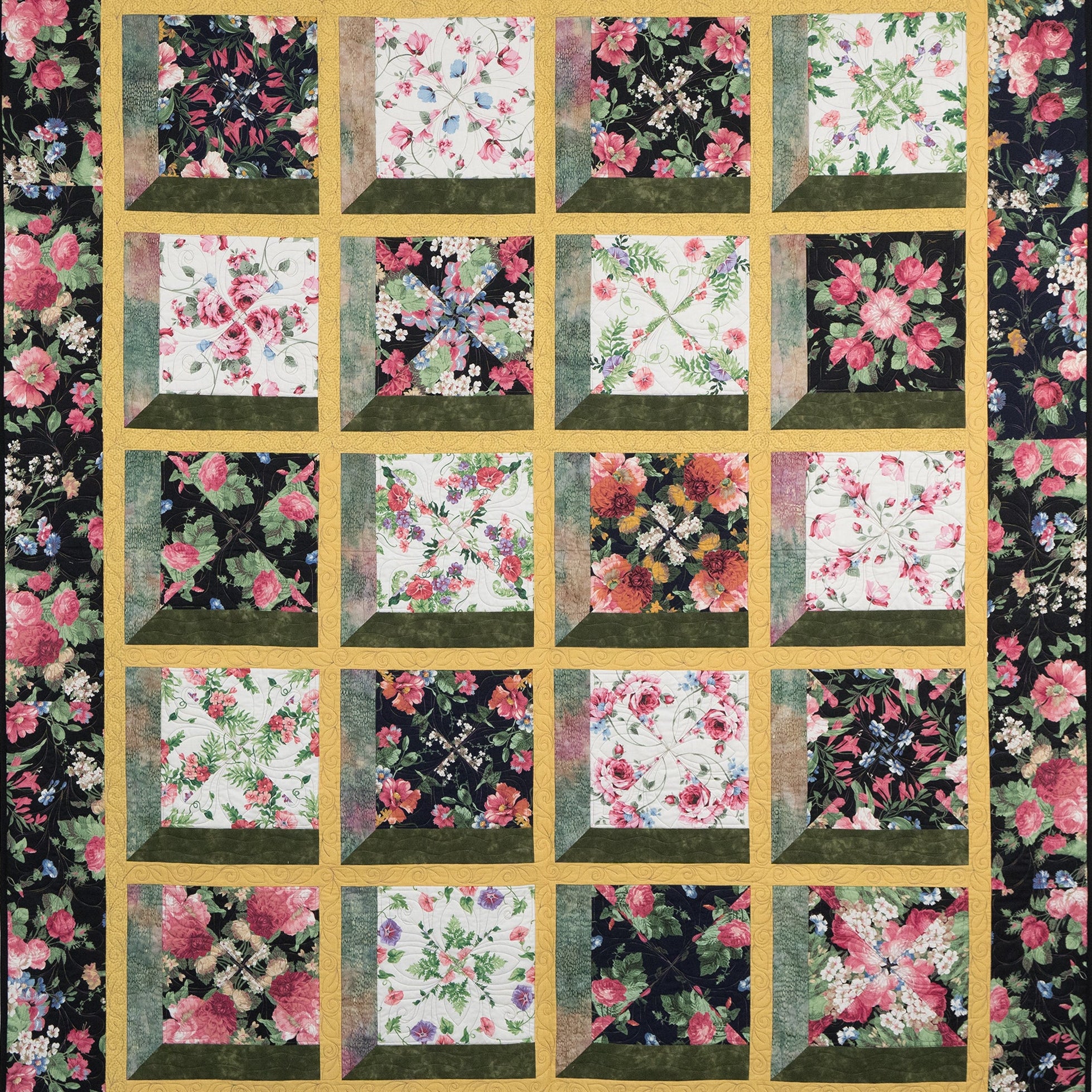 Floral quilt with a black background featuring a grid of square patterns.