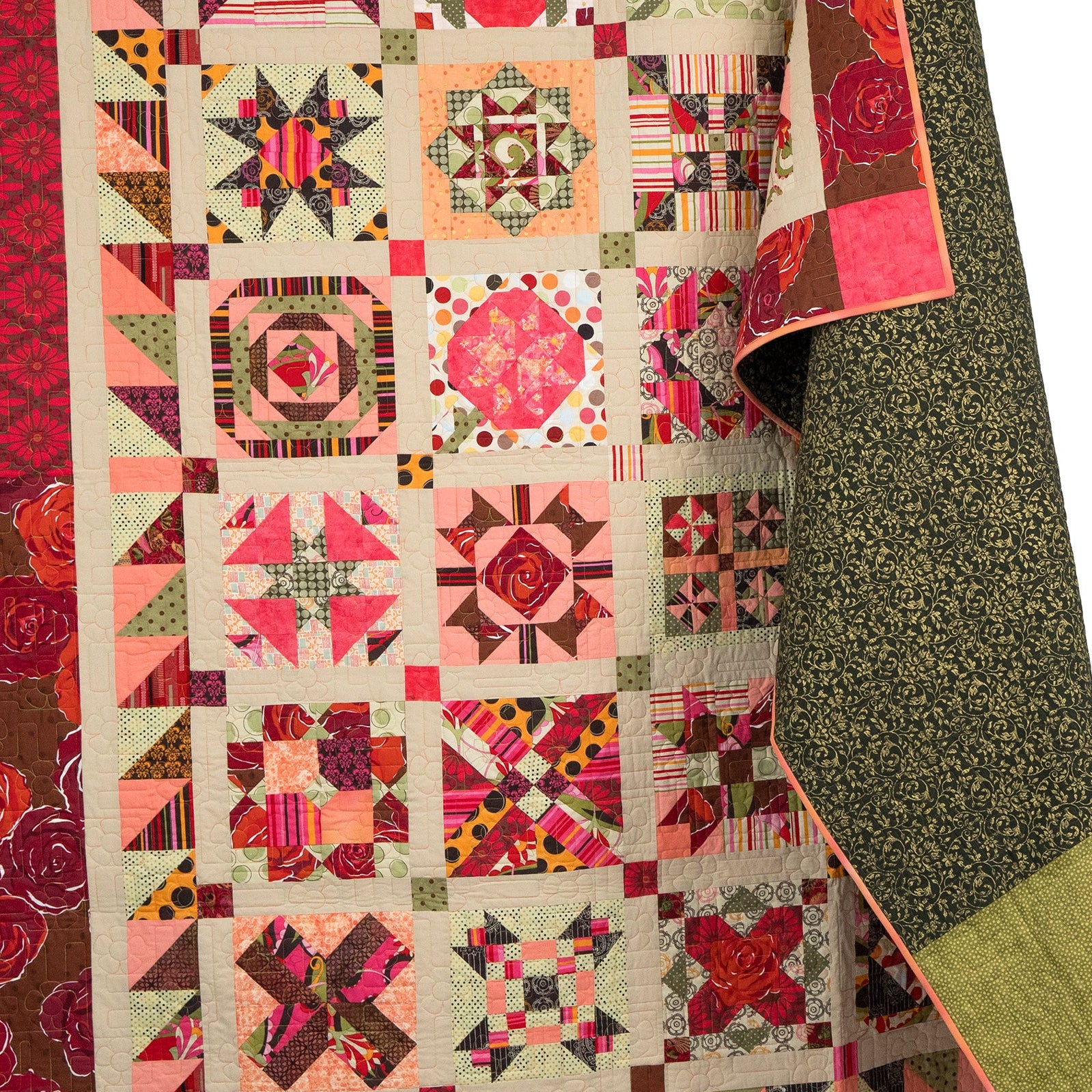 Colorful quilt with geometric patterns on a white background
