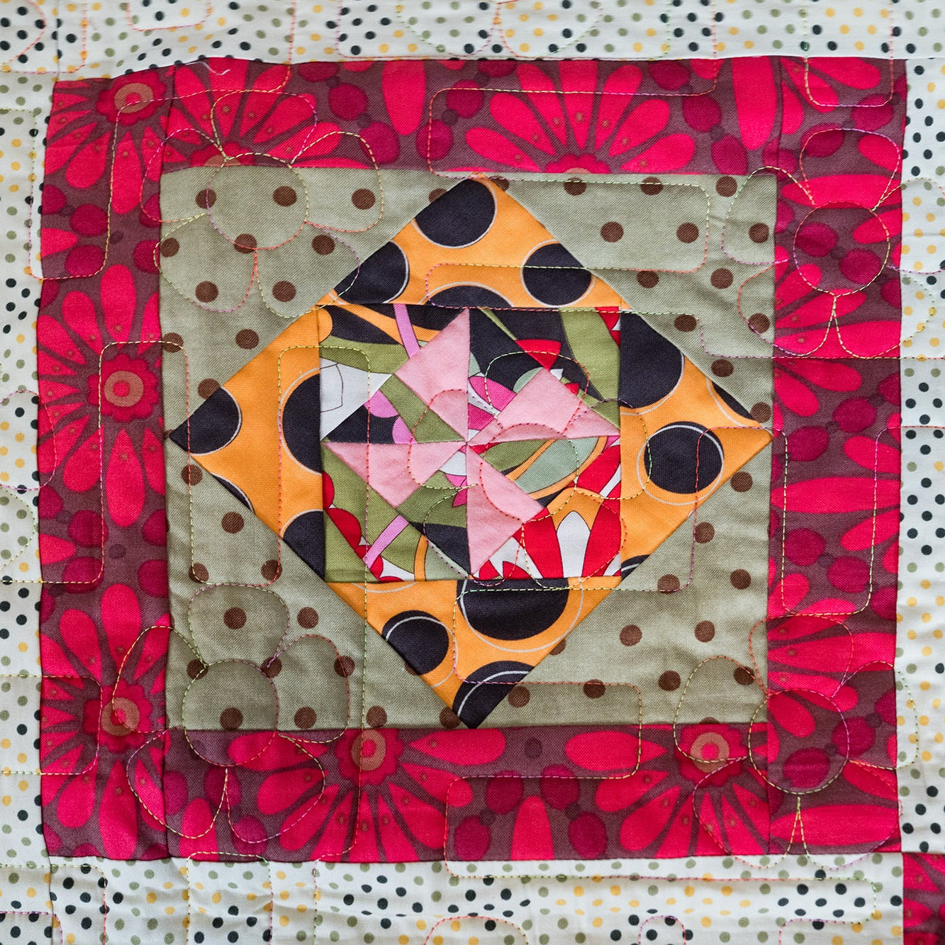 Colorful patchwork quilt with geometric patterns