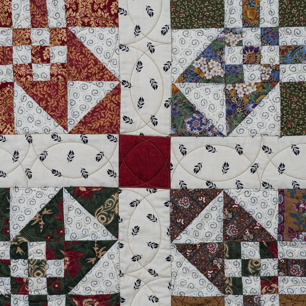 Quilt block close up of various multi colour prints