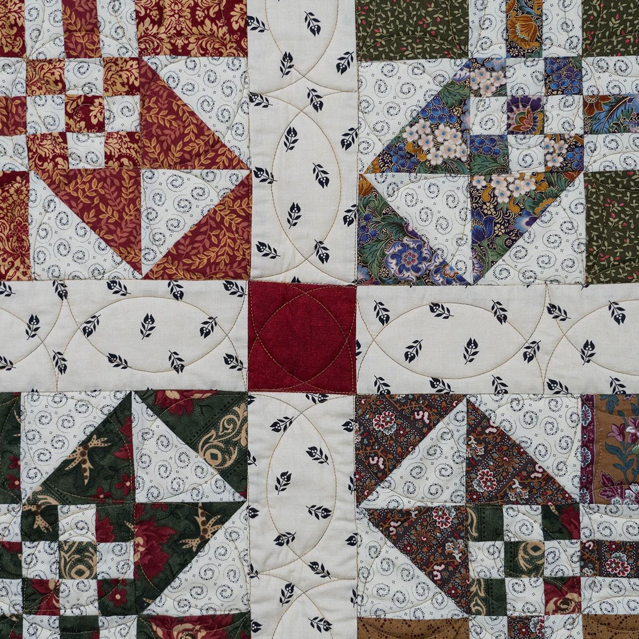 Quilt block close up of various multi colour prints