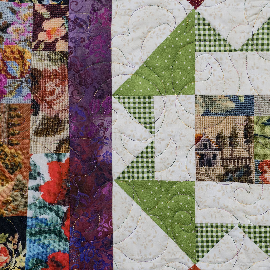 Quilt block with various patterns including floral, checkered, and landscape.