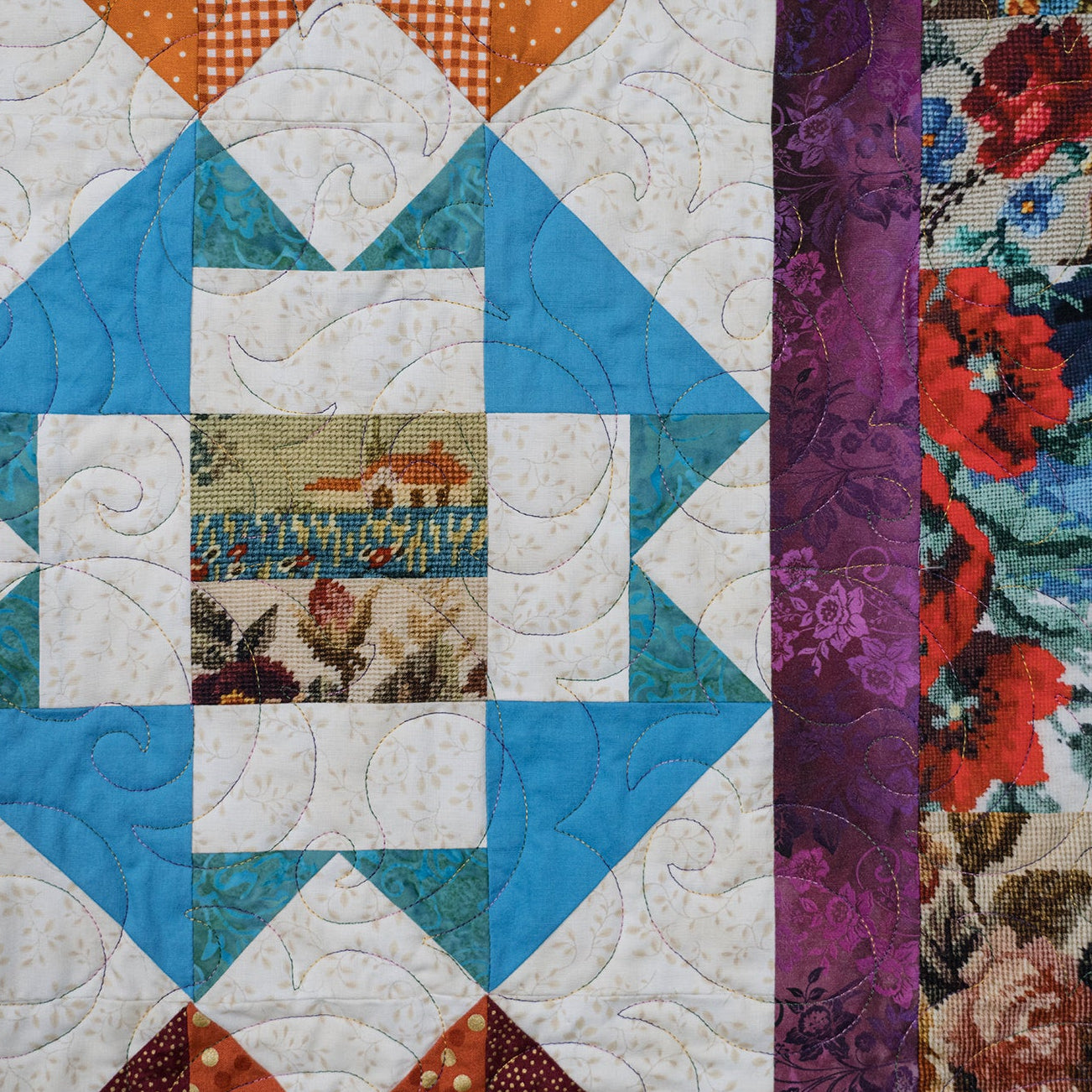 Quilt with geometric pattern and floral accents