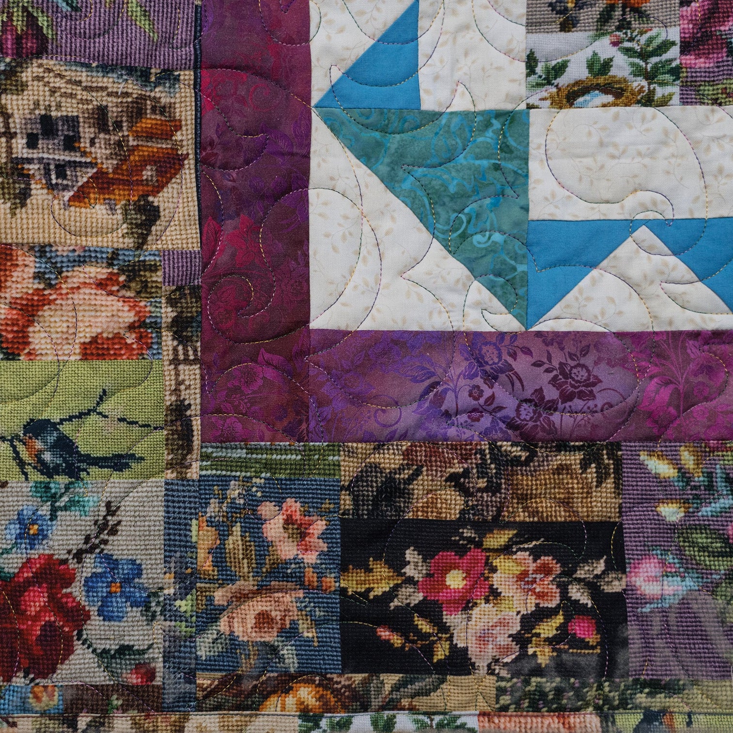 Patchwork quilt with floral and geometric patterns