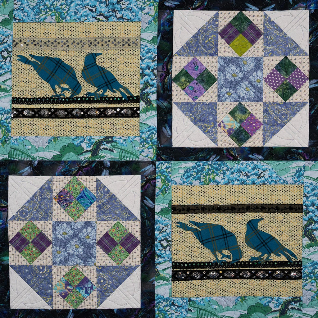 Quilt with various patterns and bird designs on a patchwork background