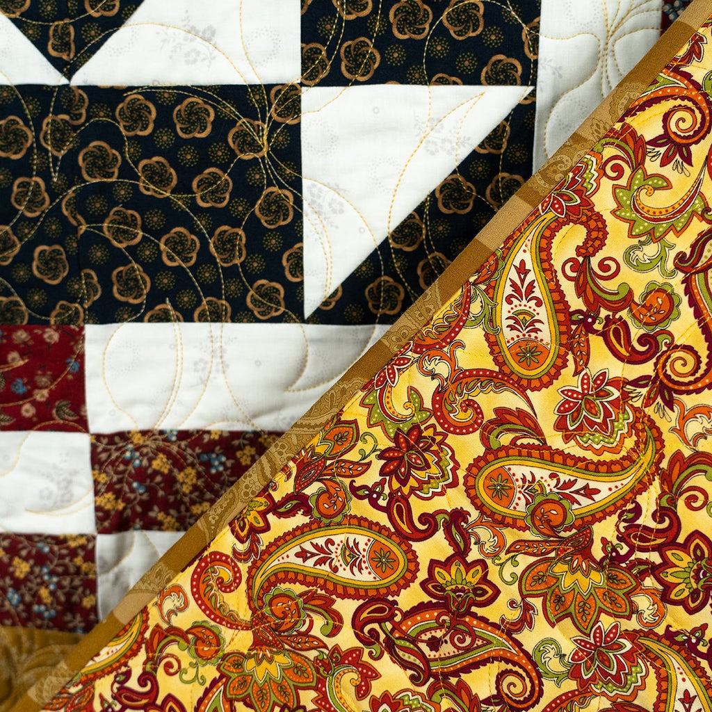 Patterned fabric swatches including paisley and geometric designs.