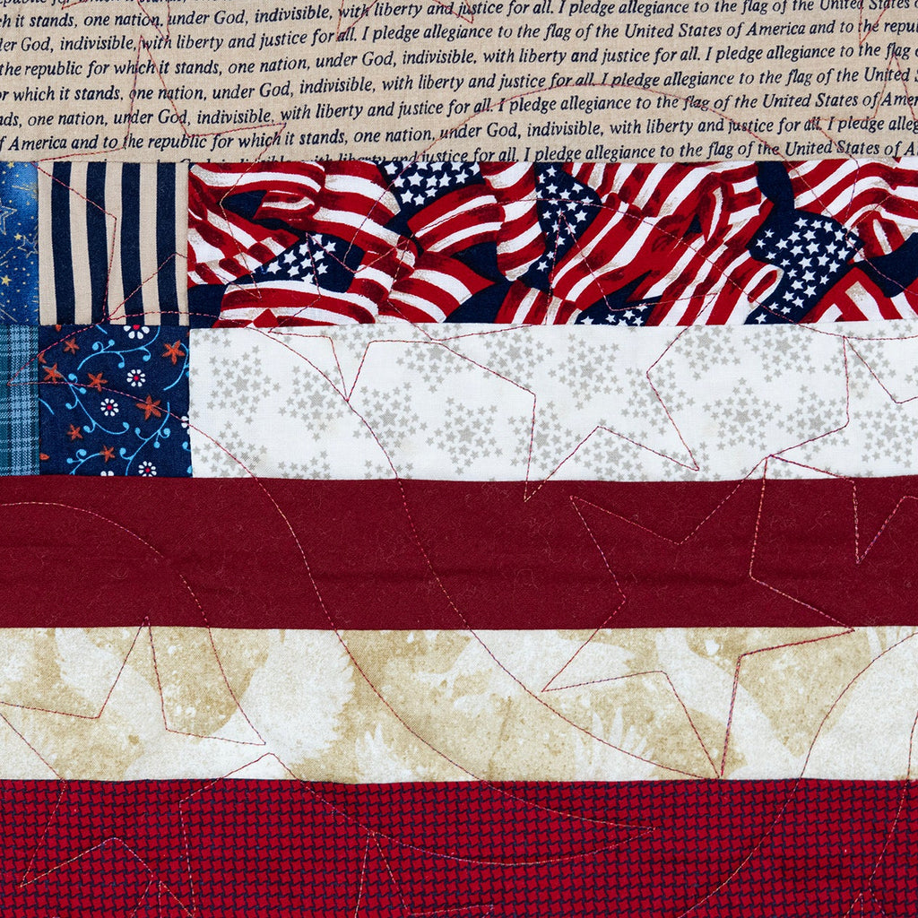 Quilt with American flag pattern and text background